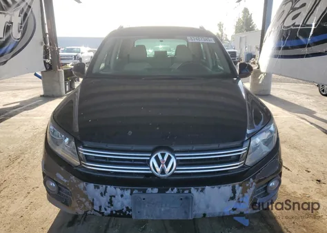 2014 Volkswagen Tiguan S from USA, damaged, VIN WVGAV3AX2EW557334